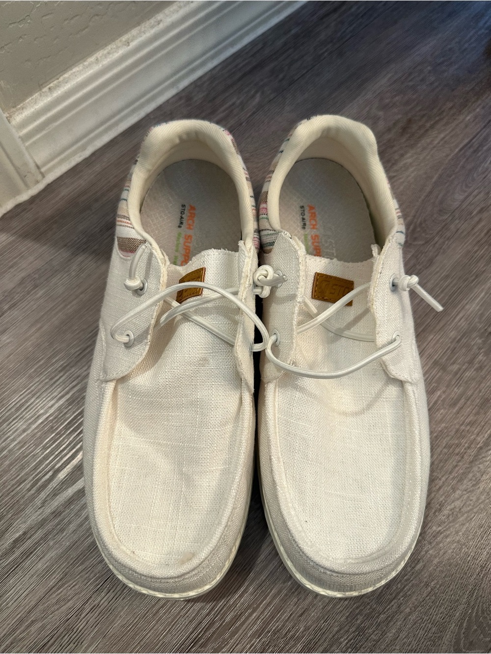 White Canvas Slip-On Sneakers with Subtle Stripe Trim